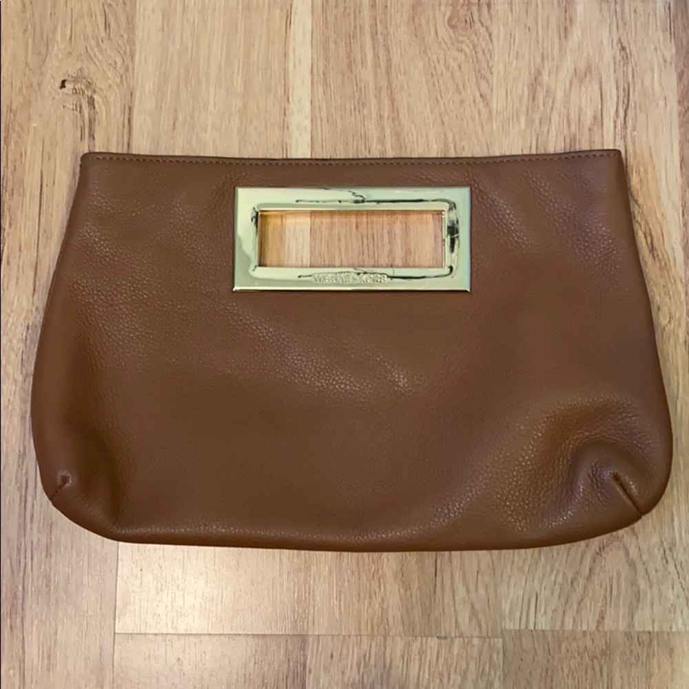 Brown leather Michael Kors clutch with gold handle